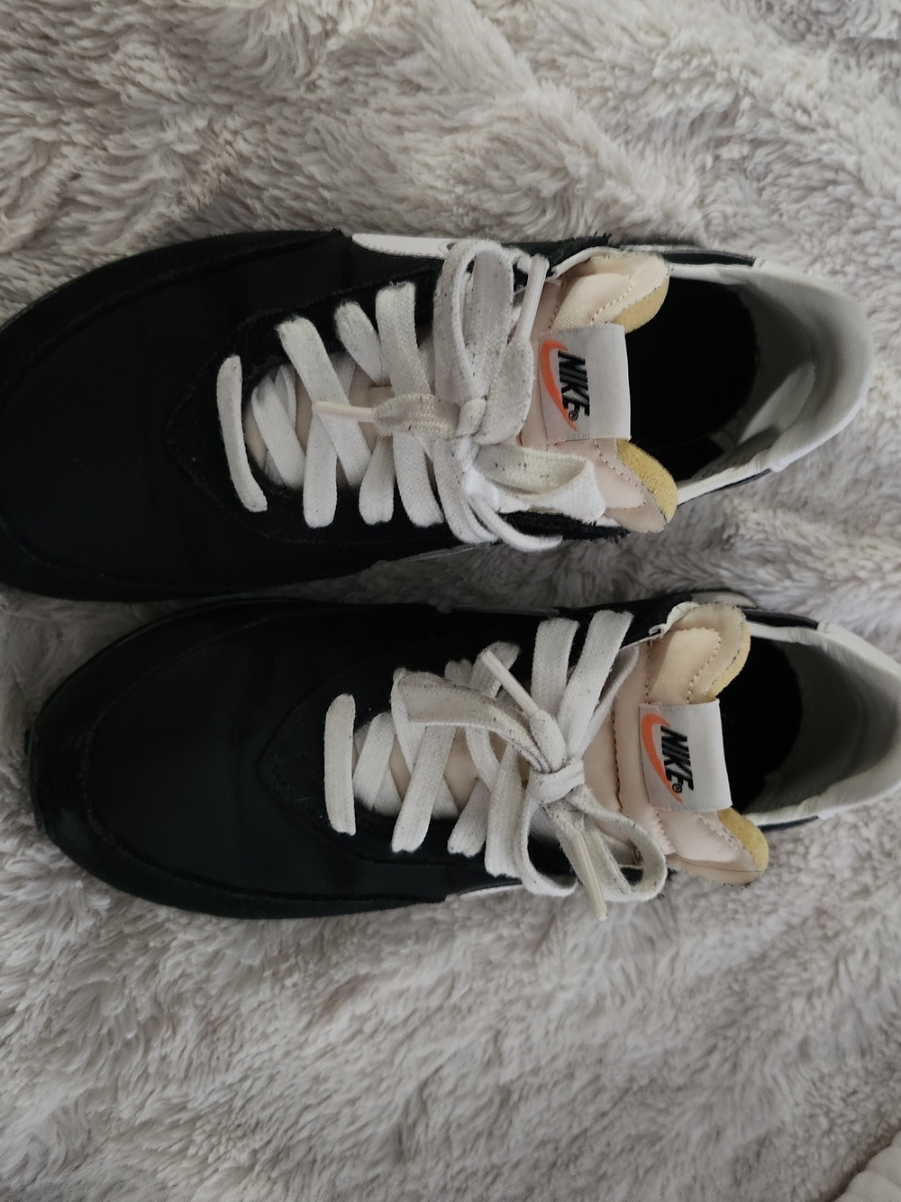 Nike Kids Black Sneakers with White Laces and Peach Accents